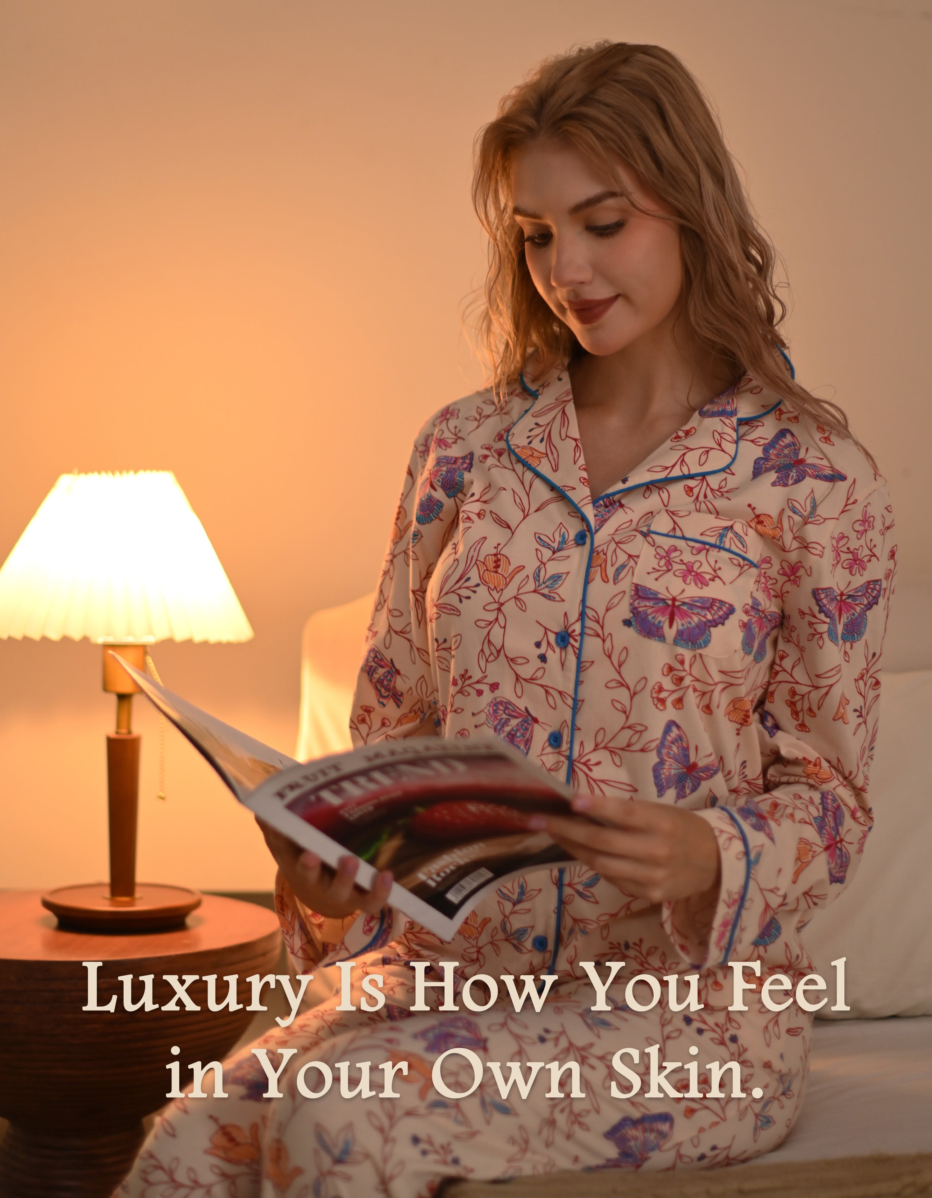 Woman wearing animal sketch knit cotton pajamas reading at home in a cozy night scene