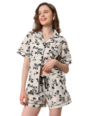 Black floral women’s woven cotton pajama set front view on white background