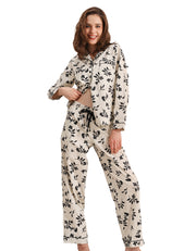 Black and white floral women’s woven cotton pajama set front view on white background