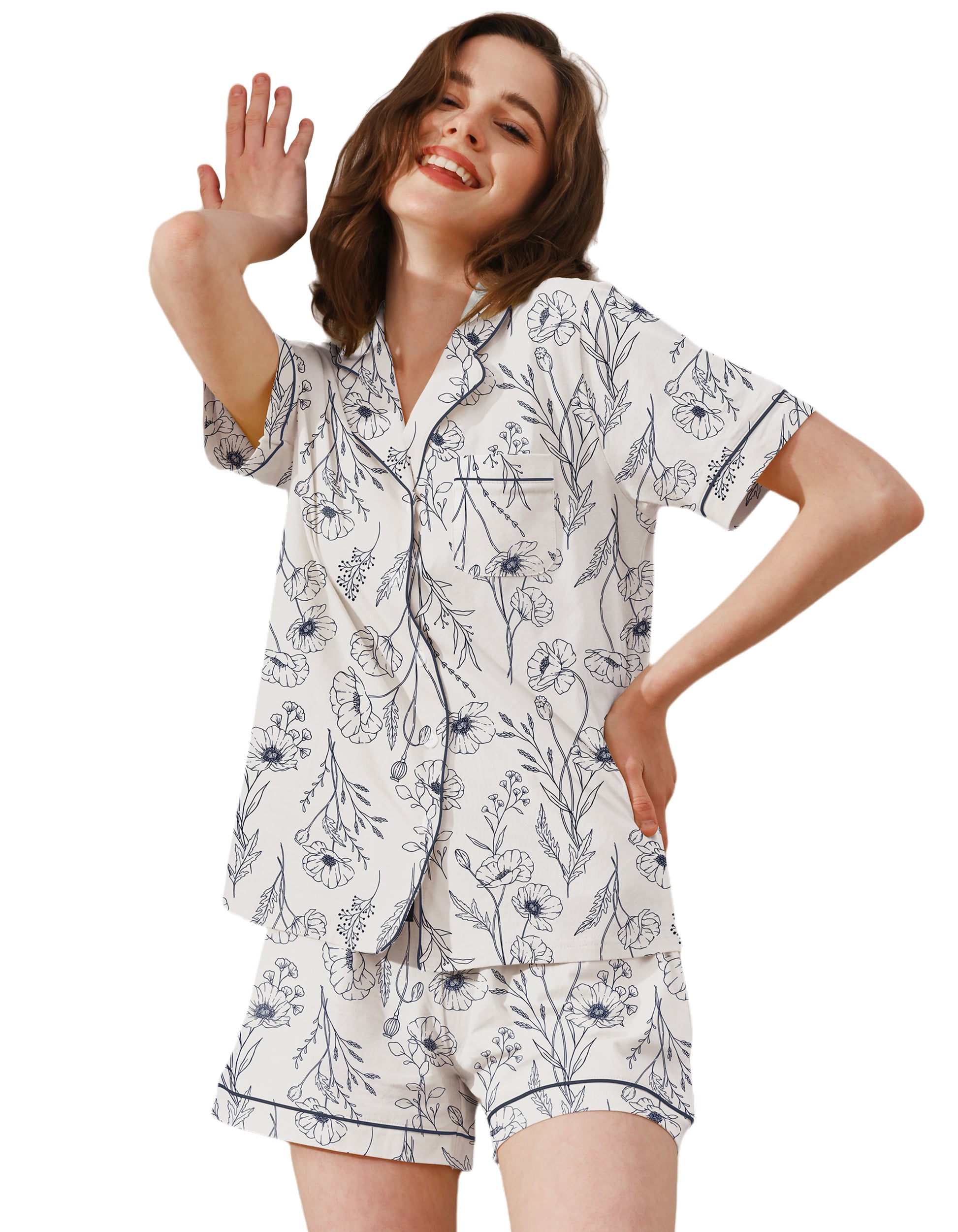 Line art poppy print women’s knit cotton pajama set with short sleeve top and shorts on white background