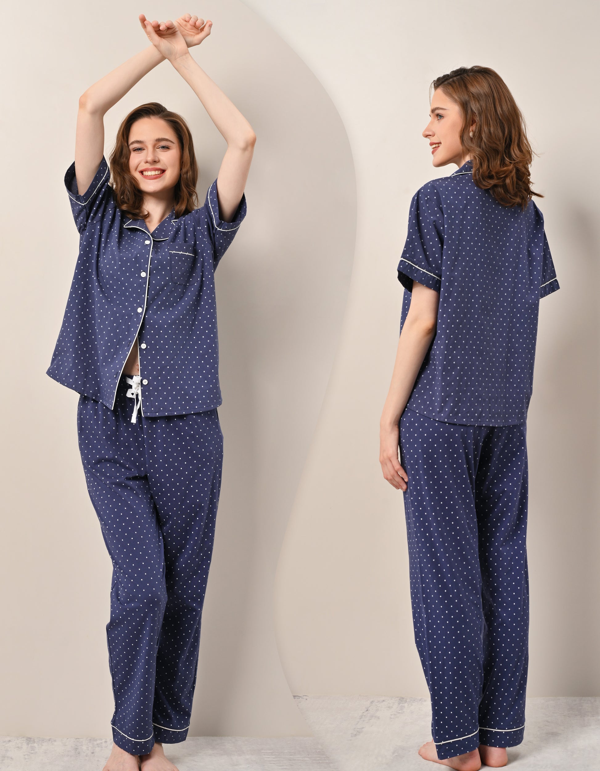 Front and back view of women’s navy polka dot cotton pajama set with short sleeves and long pants
