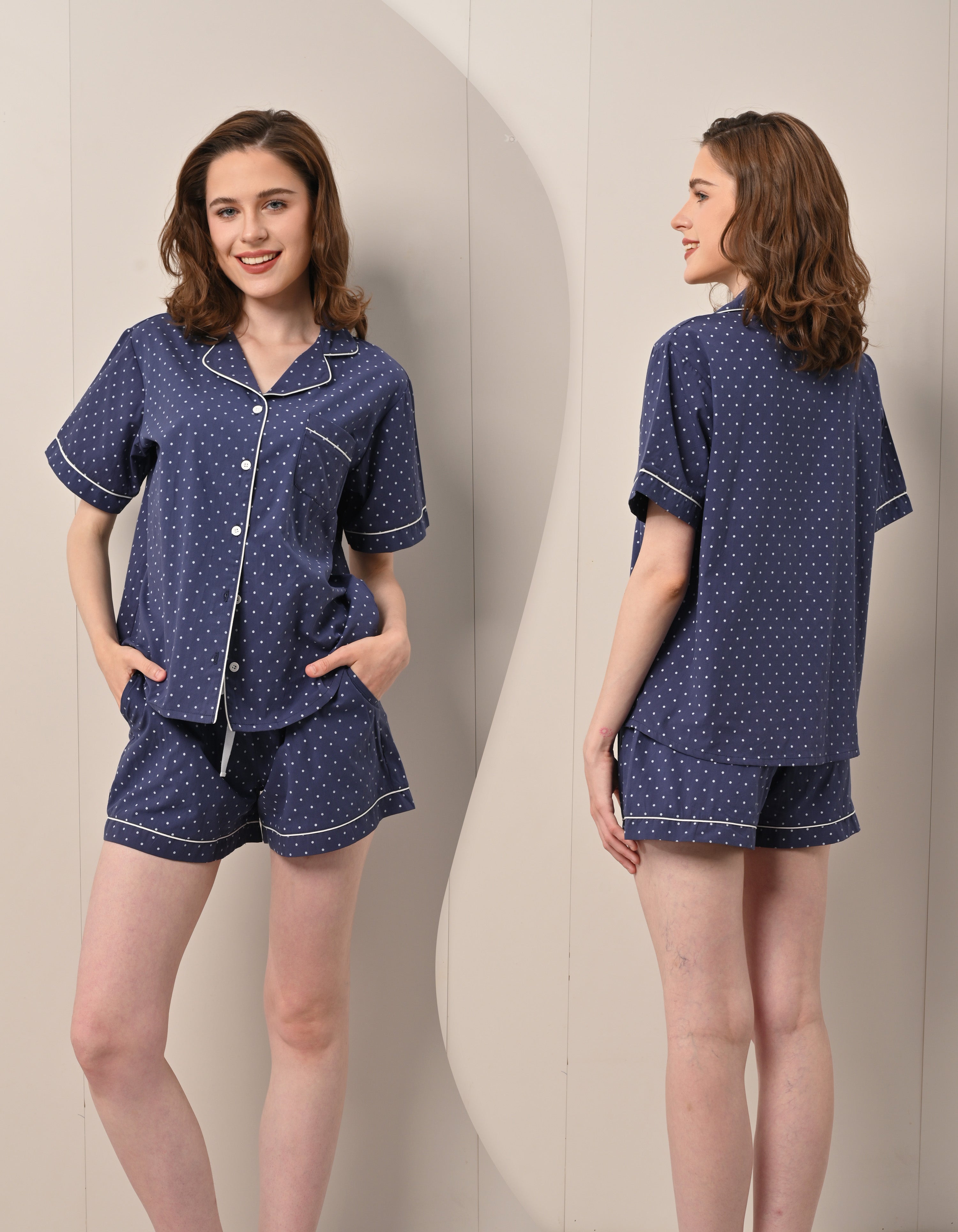 Front and back view comparison of navy polka dot women’s woven cotton pajama set
