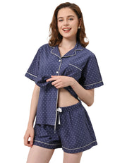 Navy polka dot print women’s knit cotton pajama set with short sleeve top and shorts on white background