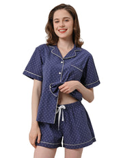 Navy polka dot women’s woven cotton pajama set front view on white background