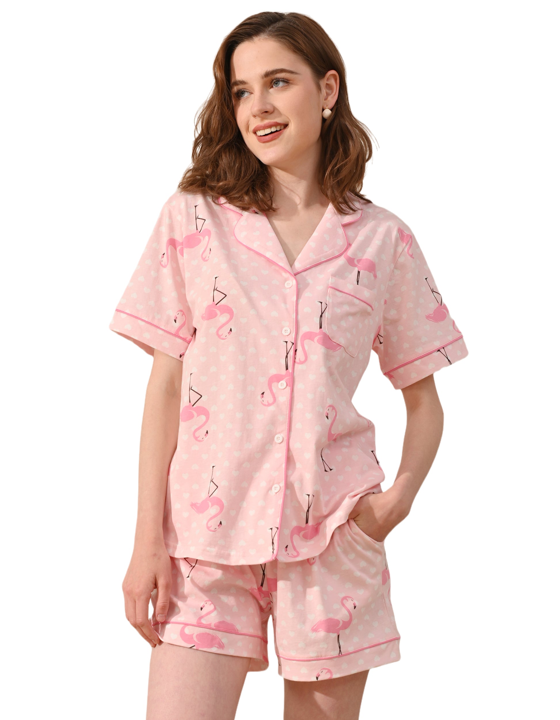 Pink flamingo print women’s knit cotton pajama set with short sleeve top and shorts on white background