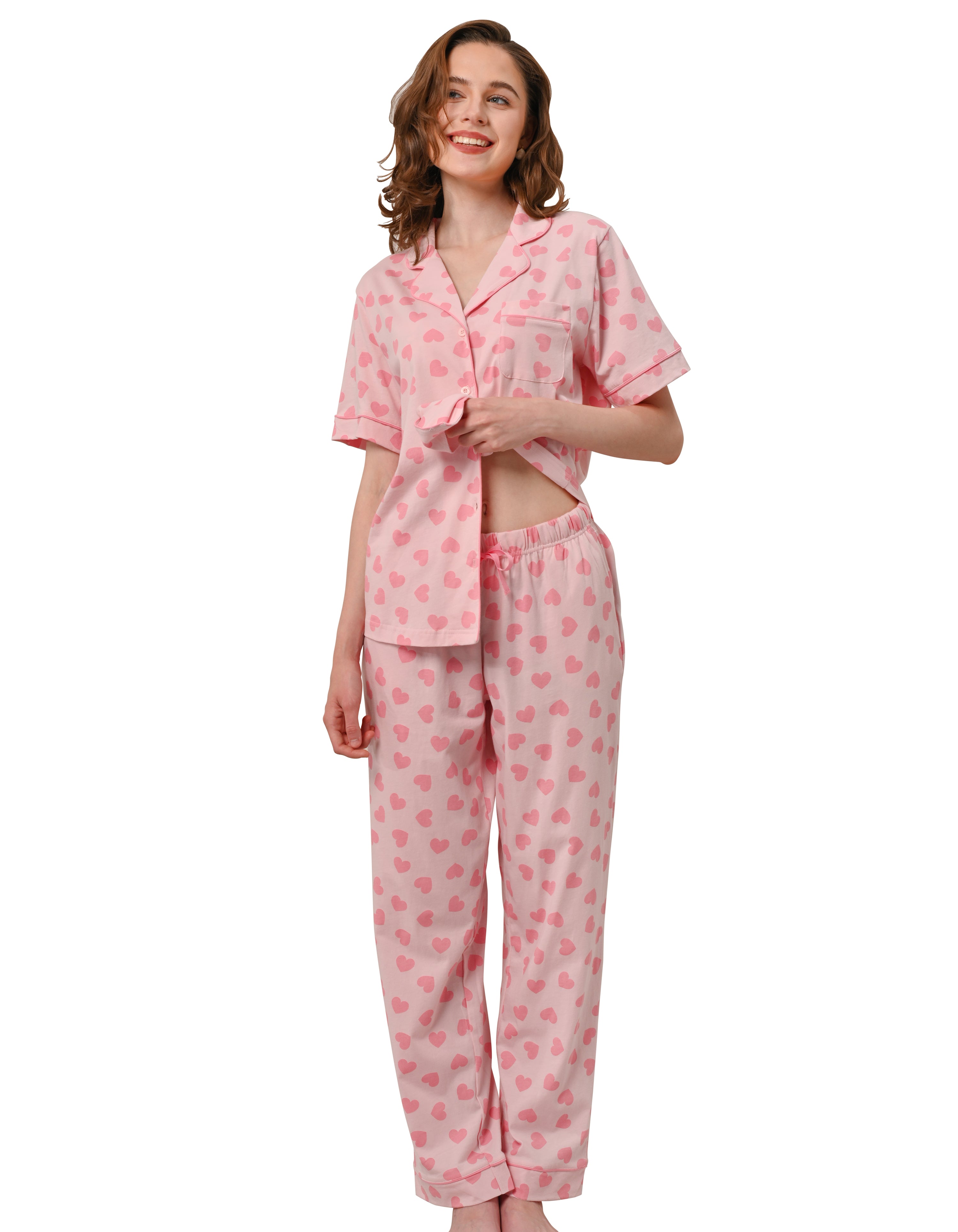 Pink heart print women’s cotton pajama set front view on white background