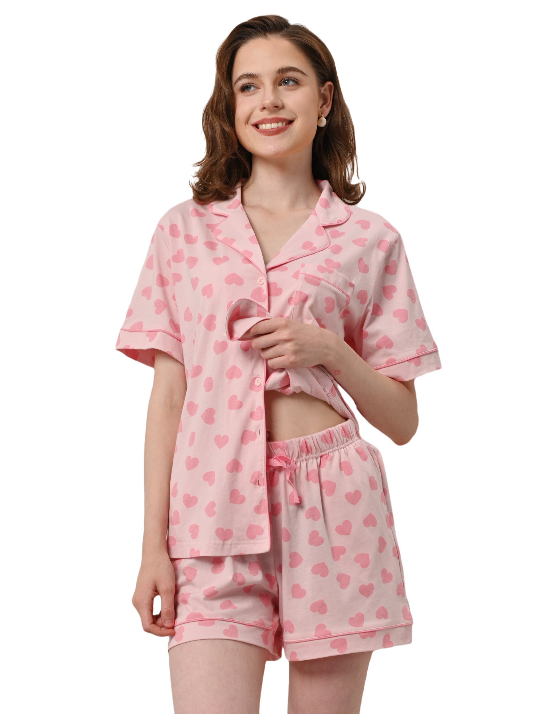 Pink heart print women’s knit cotton pajama set with short sleeve top and shorts on white background