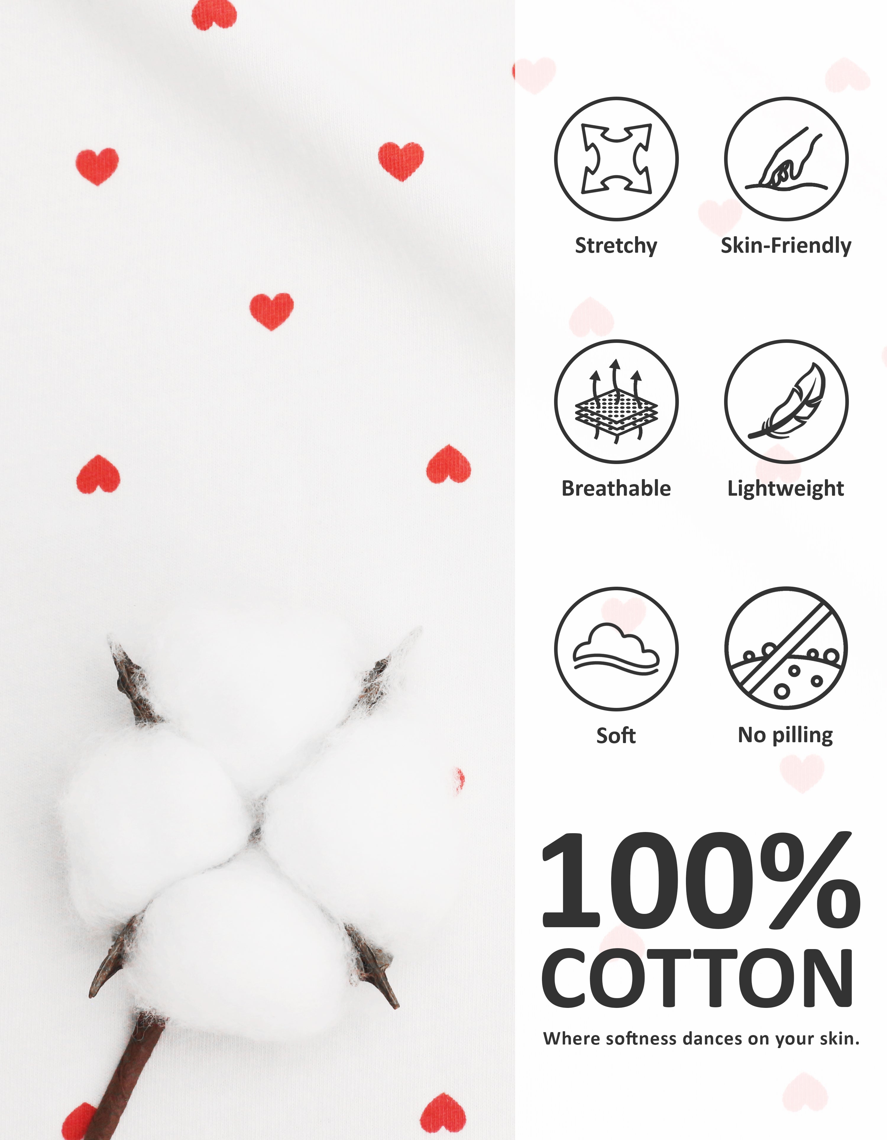 Close-up of red heart knit cotton pajama fabric showing softness and breathability