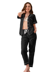 Solid black knit cotton women’s pajama set front view on white background