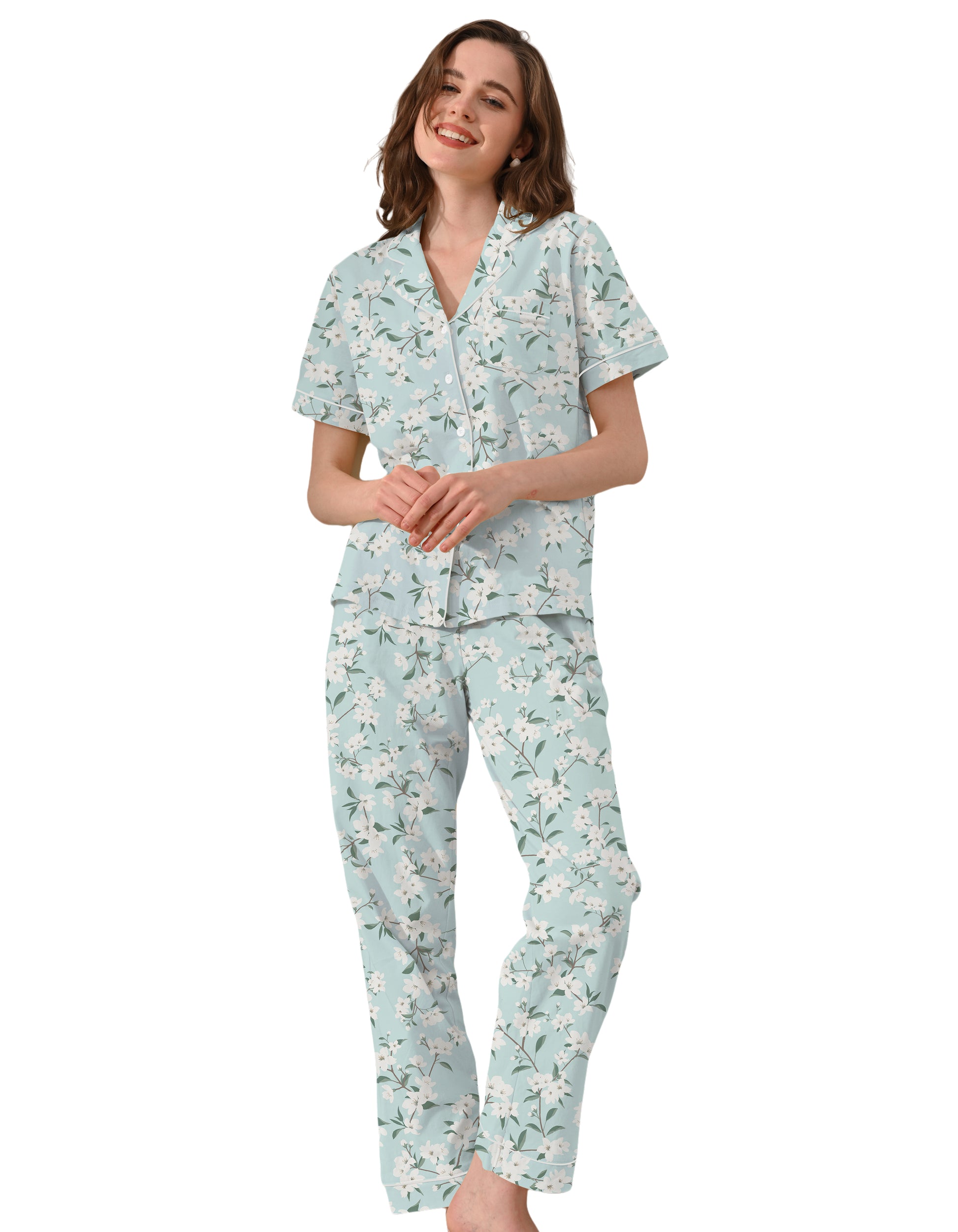 Women’s gardenia floral cotton pajama set with short sleeve button-down top and long pants on white background
