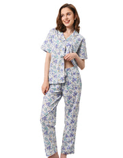 Women’s blue floral cotton pajama set short sleeve button down top and long pants white background