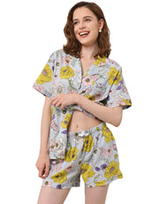 Yellow chrysanthemum floral print women’s knit cotton pajama set with short sleeve top and shorts on white background